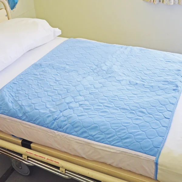 Smart Barrier Bed Pad with waterproof backing (with tuck-in). 2.5 Litre Absorbency 90cm x 85cm Light Blue, Each (SB BPPUT)